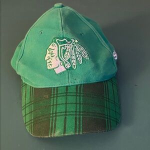 Kick 10 men’s shamrock green Blackhawks ball cap. One size fits all.
